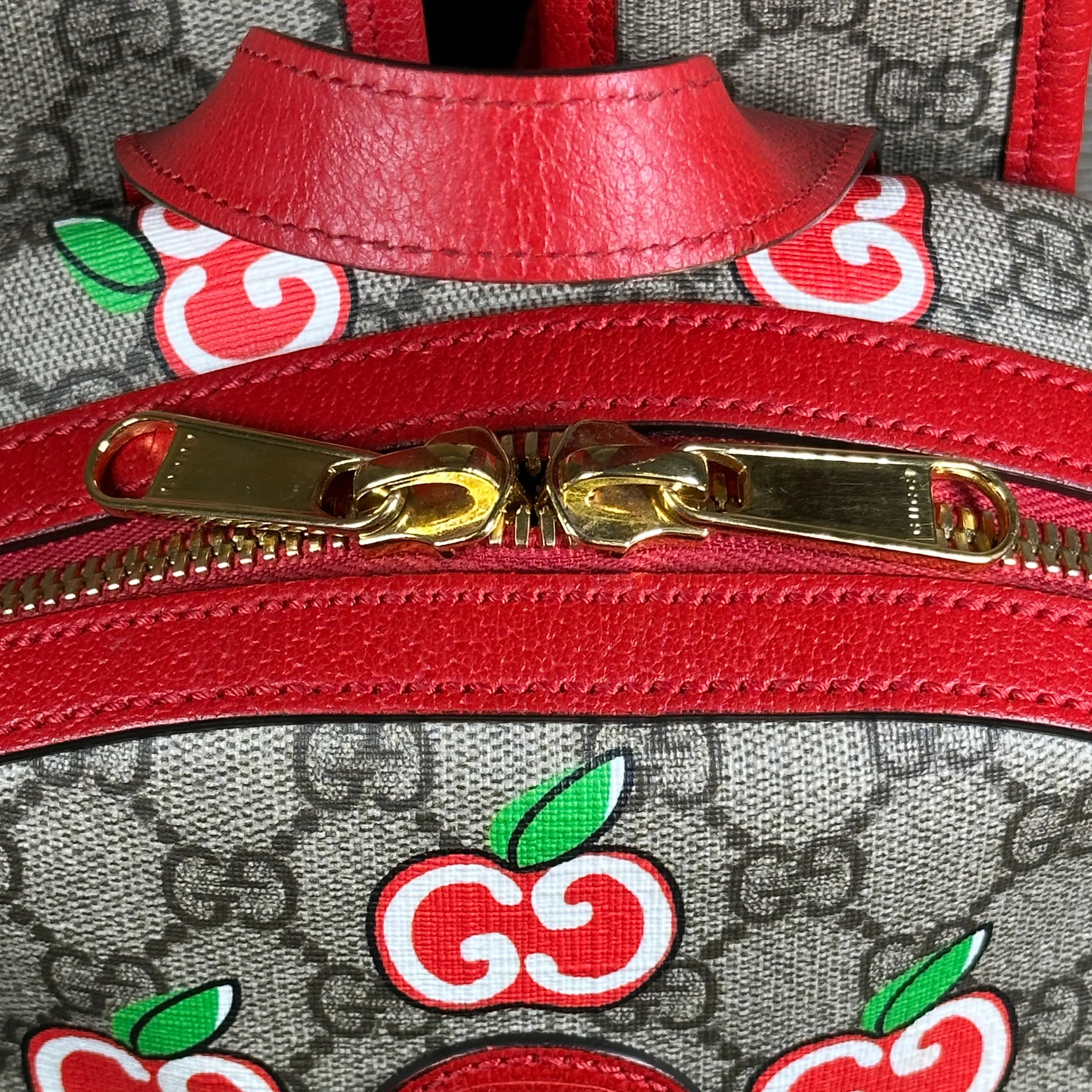 Gucci GG Supreme Canvas Interlocking Apple Backpack