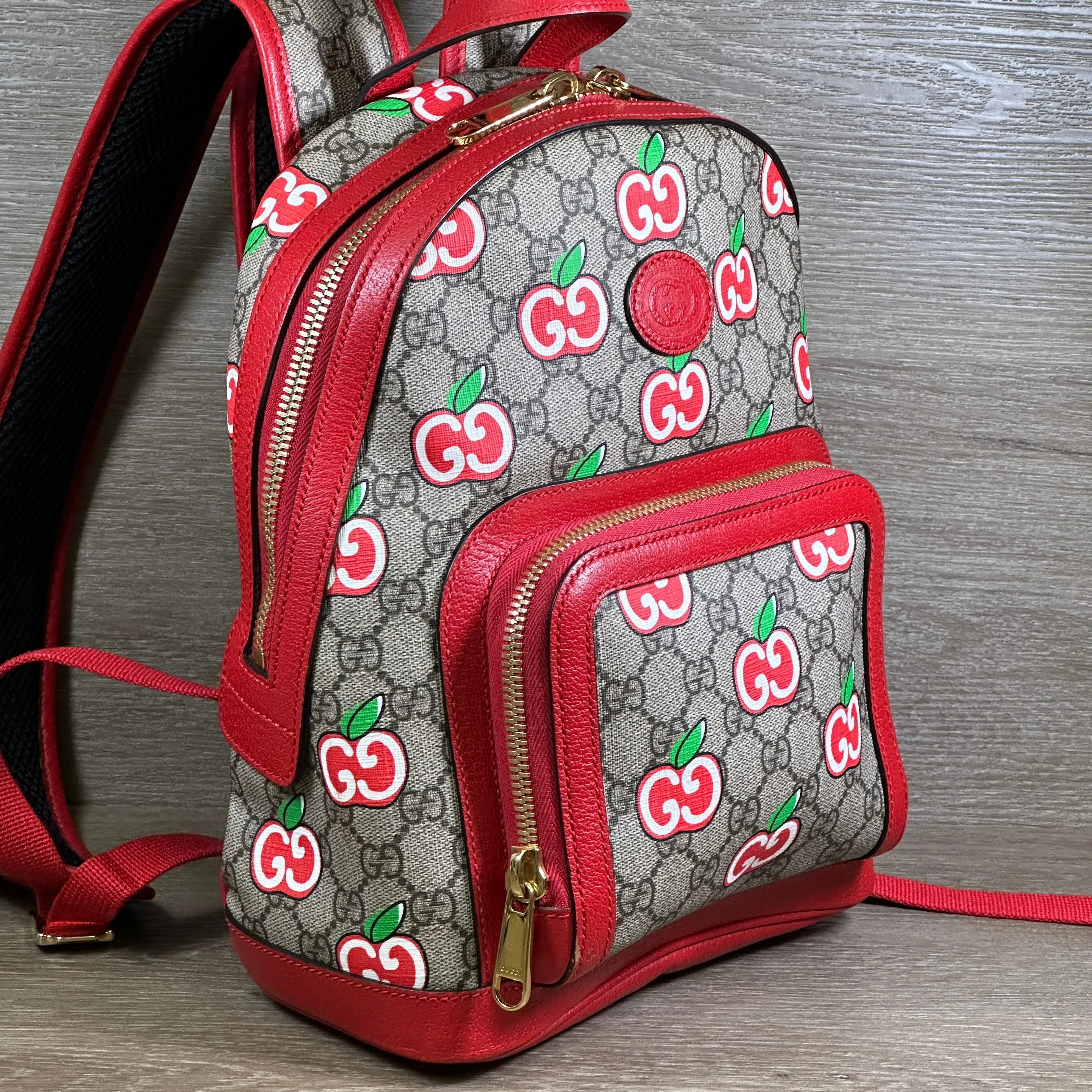 Gucci GG Supreme Canvas Interlocking Apple Backpack