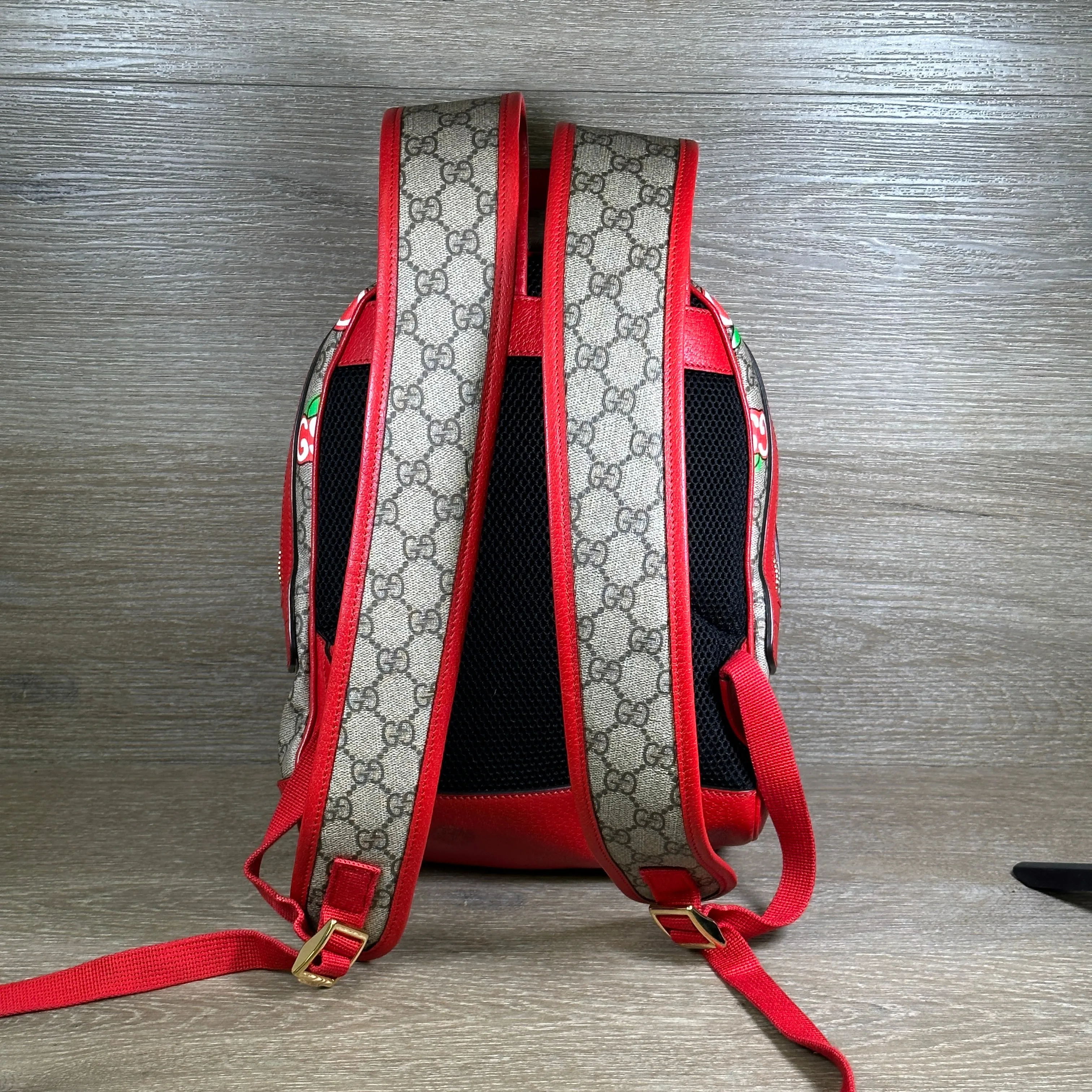 Gucci GG Supreme Canvas Interlocking Apple Backpack