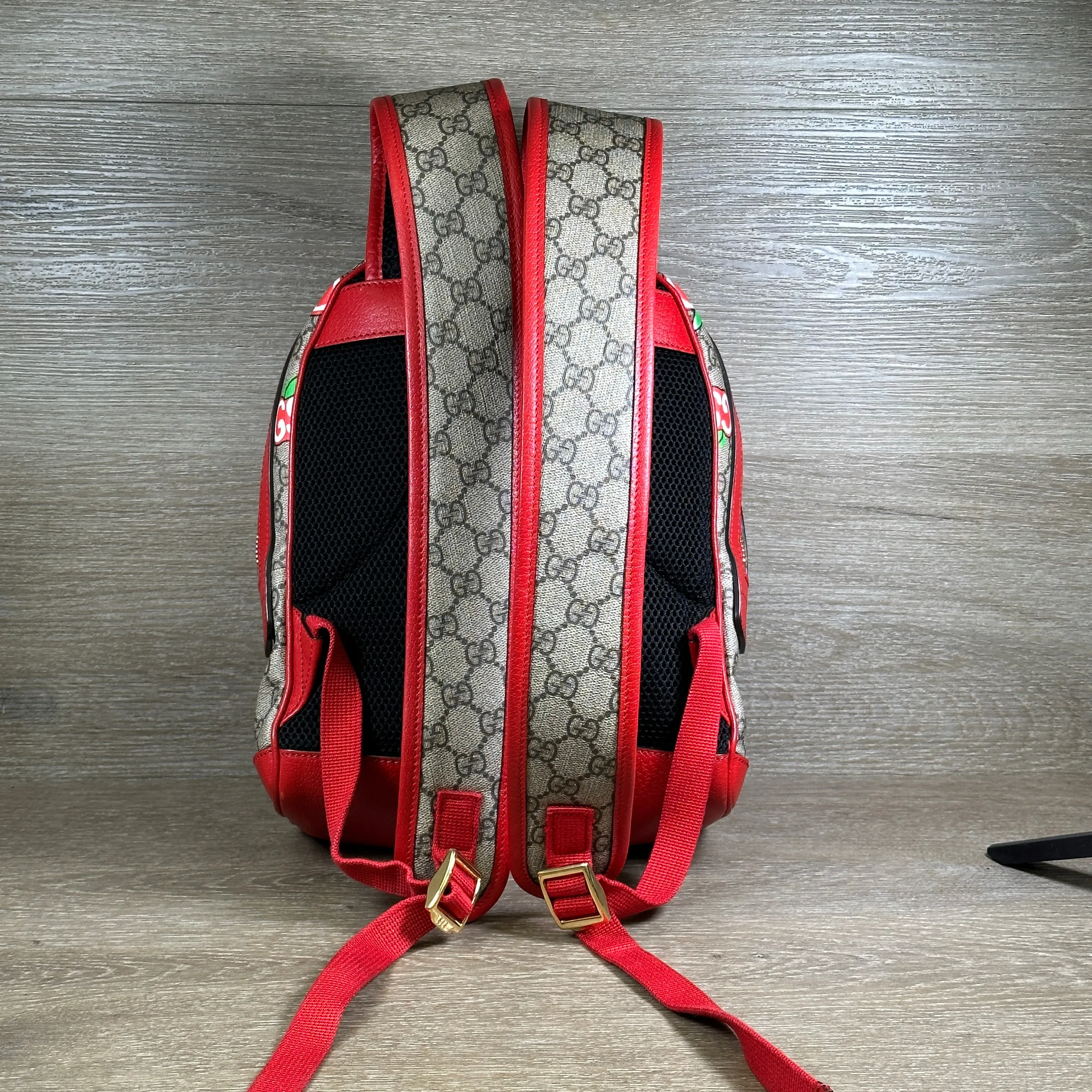 Gucci GG Supreme Canvas Interlocking Apple Backpack