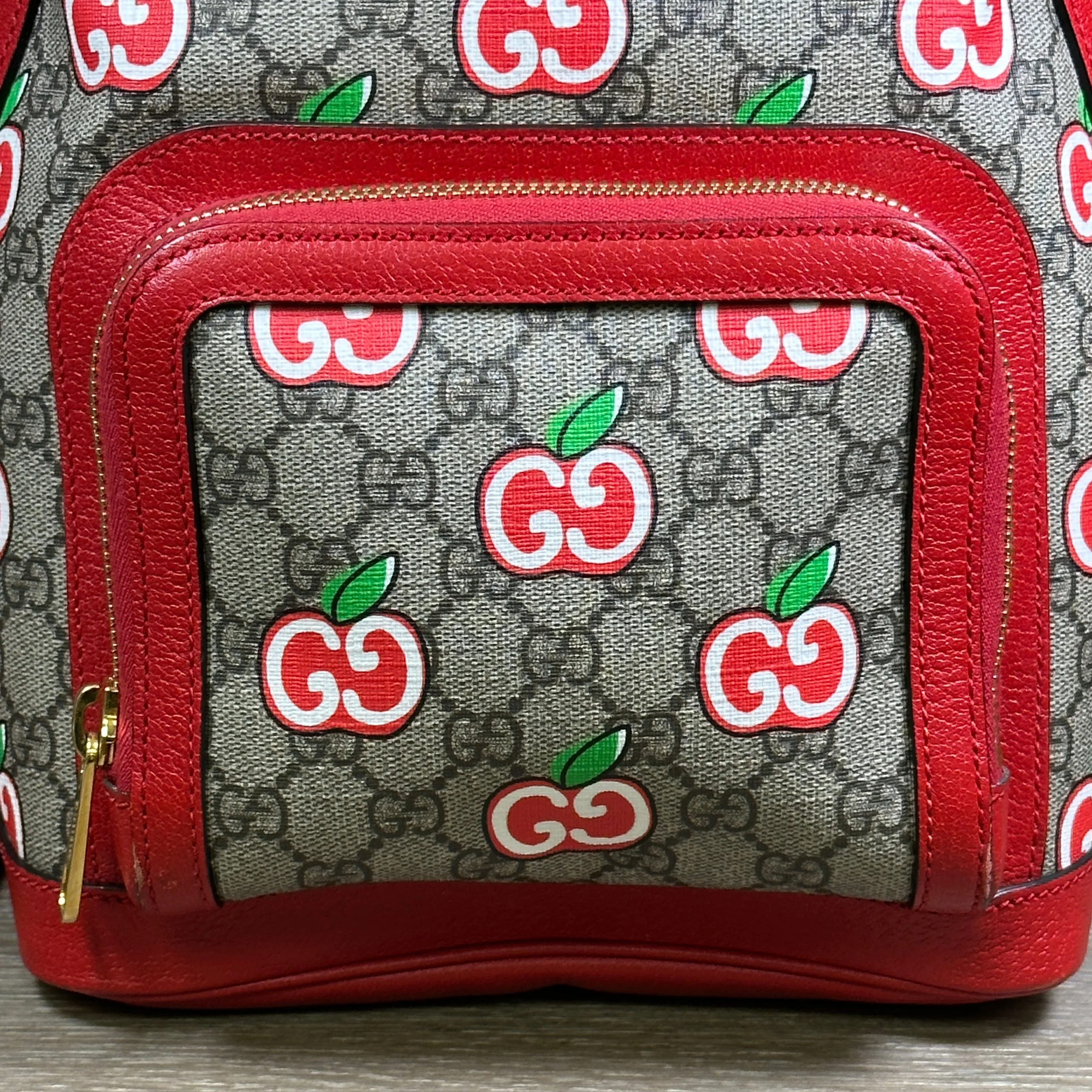 Gucci GG Supreme Canvas Interlocking Apple Backpack