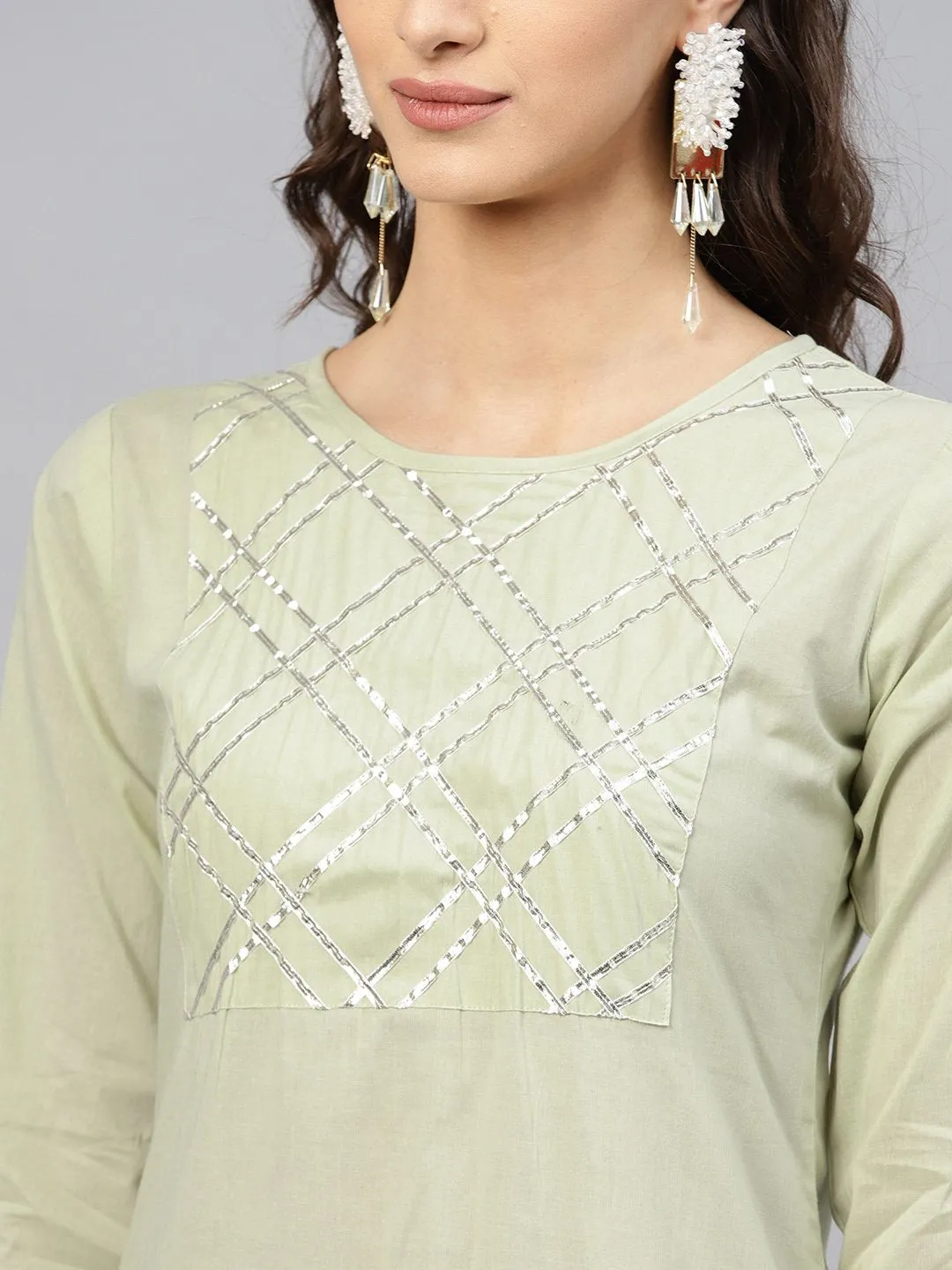 Pastel Green 3/4th sleeve cotton kurta with gotta patti work at yoke and ankle length palazzo