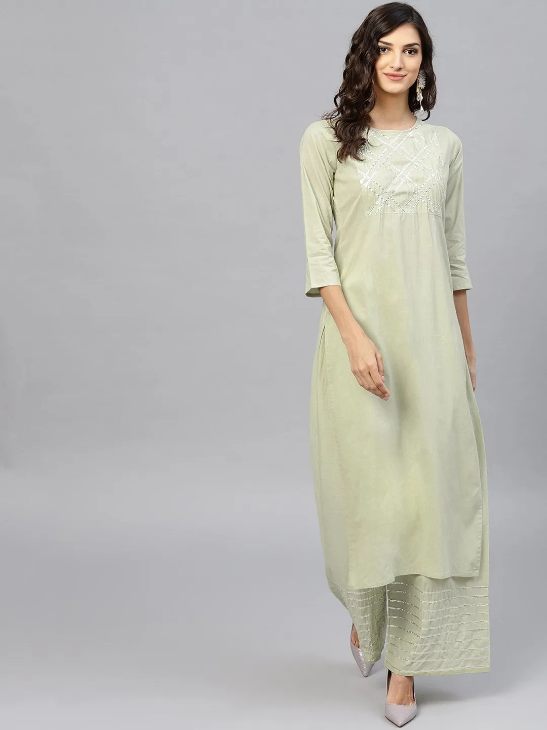 Pastel Green 3/4th sleeve cotton kurta with gotta patti work at yoke and ankle length palazzo